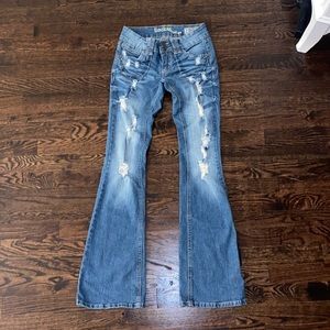 Boot cut ripped jeans